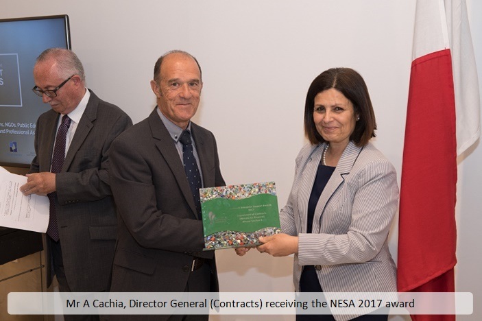 Mr Anthony Cachia (DG Contracts) receiving the NESA 2017 Award